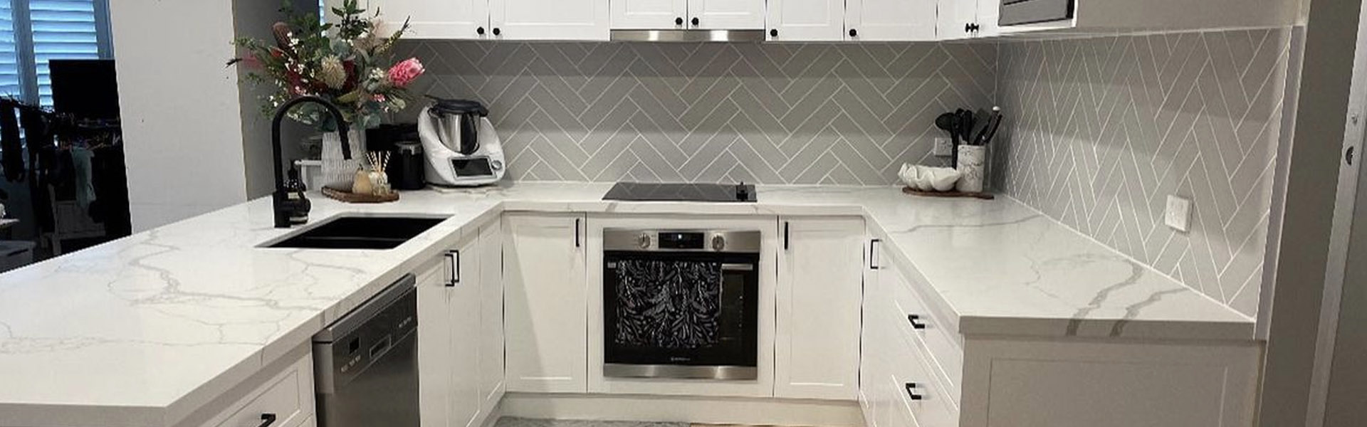 Custom kitchen with herringbone splashback in Penrith