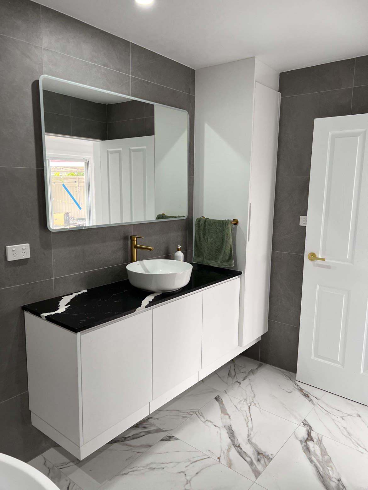 Renovated bathroom vanity and cabinetry